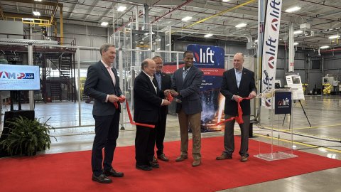 Photo of the ribbon cutting at LIFT's Advanced Metallic Production and Processing (AMPP) Center